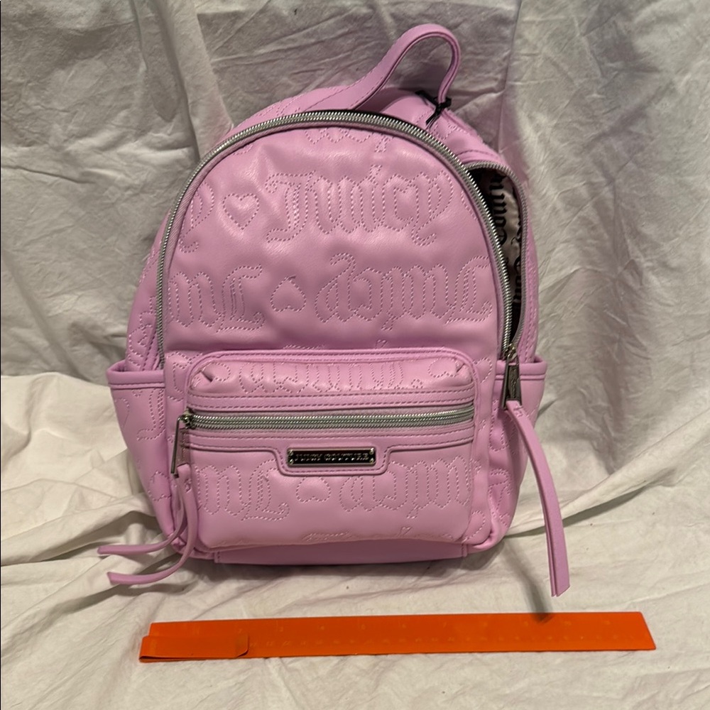 🌵🌵Juicy Couture Light Pink Embossed mini Backpack